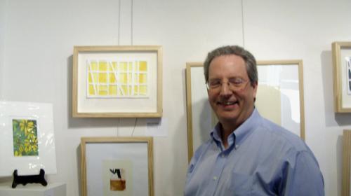 Bill Brookover with his print Yellow Window #1 at Surface and Tension Print Exhibition