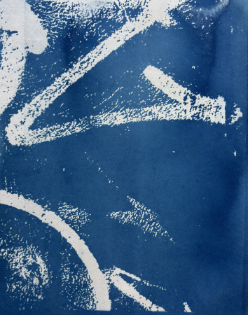 white graffiti lines across a blue background